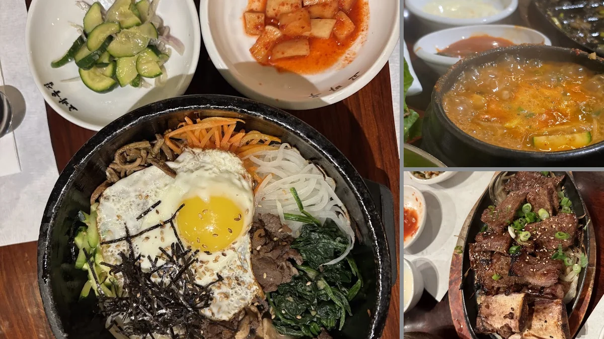 Plates of traditional Korean dishes on a dining table.